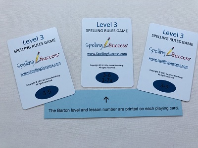 Level 3 Spelling Rules Game white cards with blue oval showing which level and lesson in the barton system these words are taught