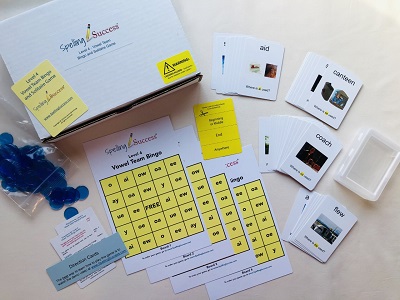 Bingo Cards and white cards with pictures of objects on them.