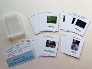 Levels 5-7 Suffix game White cards with pictures of objects on them.