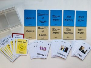 Blue and tan cards with pictures of sight words on them and white cards with pictures of objects on them.