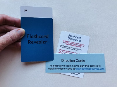Blue flashcard revealer with white flashcard direction game